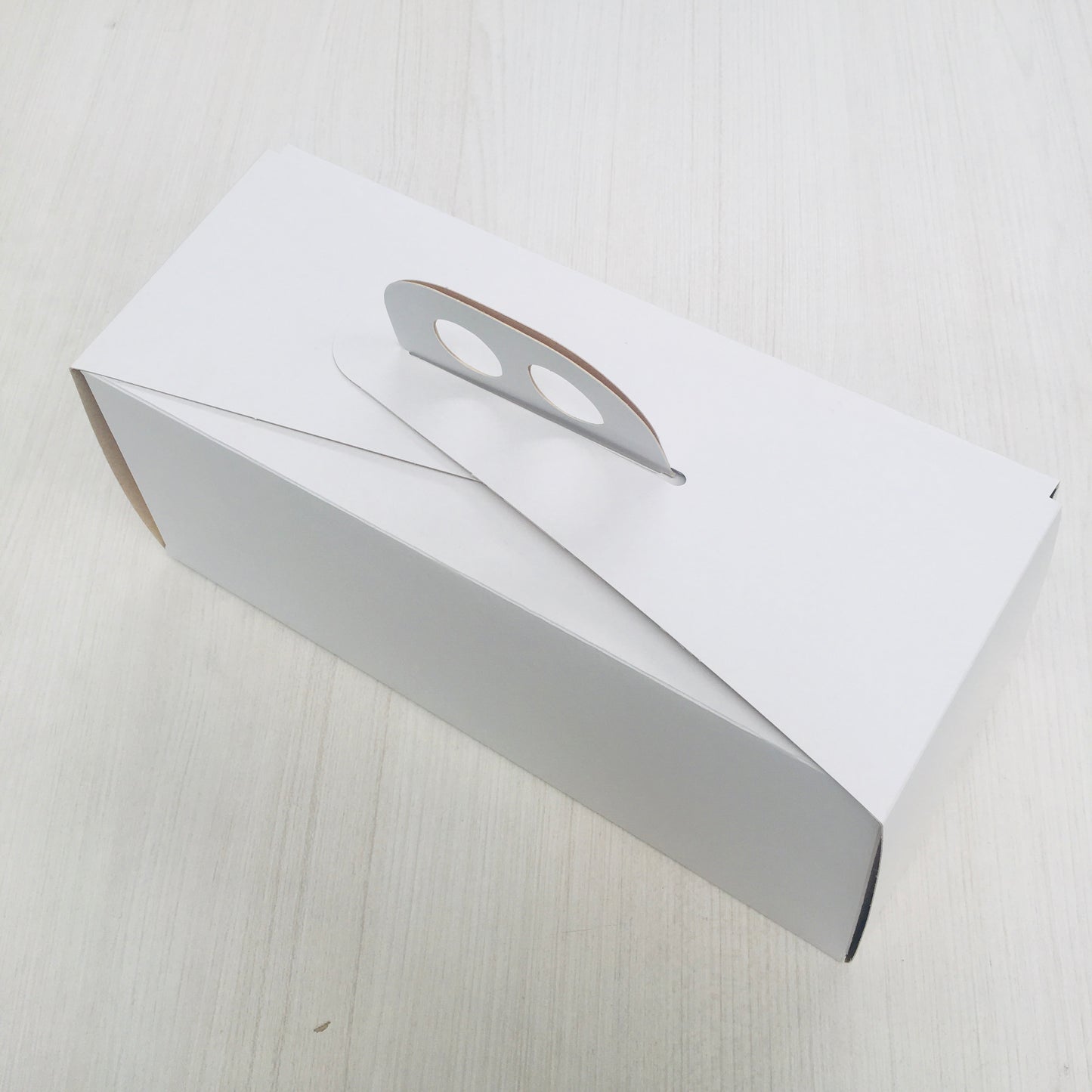 Caja Cartón Brazo de Reina